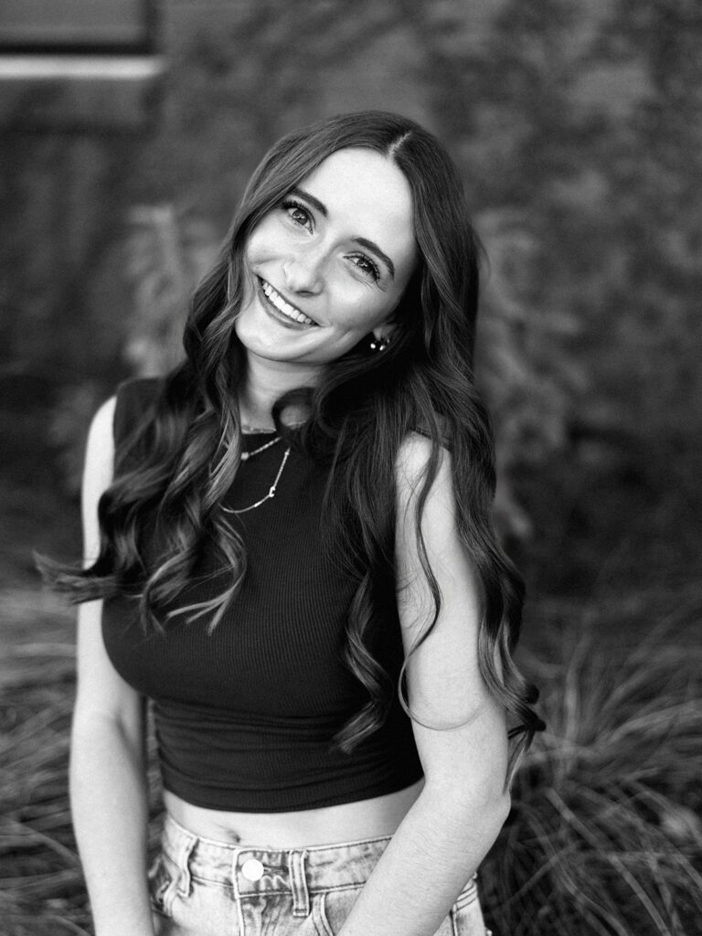 Stylish senior portraits of Lily on South Congress Avenue in Austin