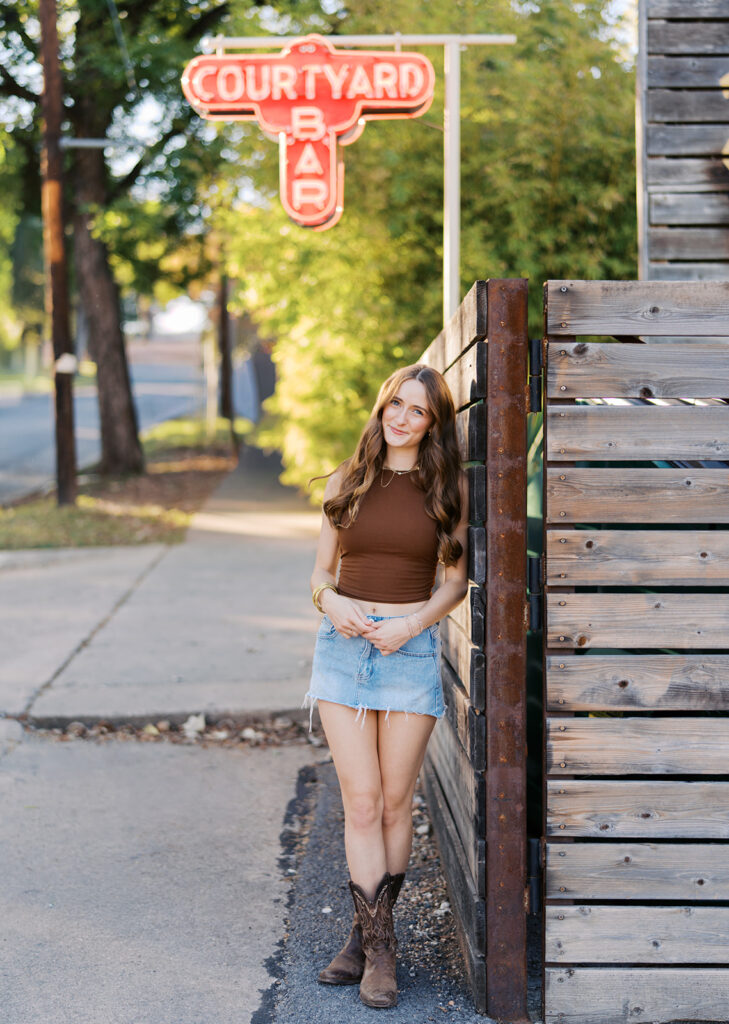 Stylish senior portraits of Lily on South Congress Avenue in Austin