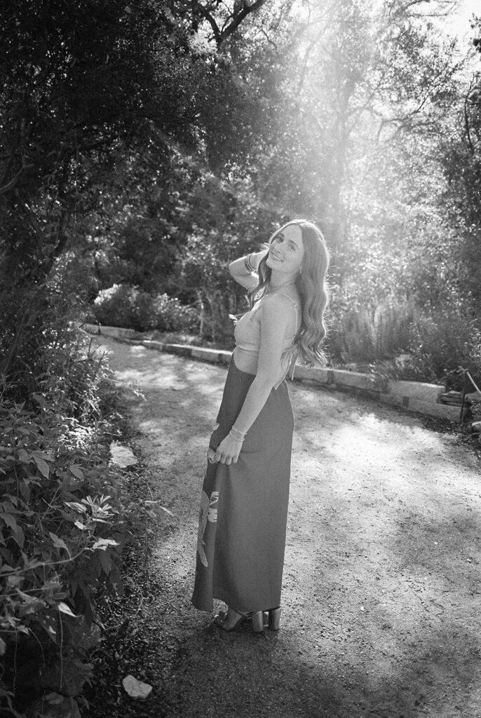 Lily smiling during Senior Portraits at Zilker Botanical Garden + South Congress in Austin Texas captured on film