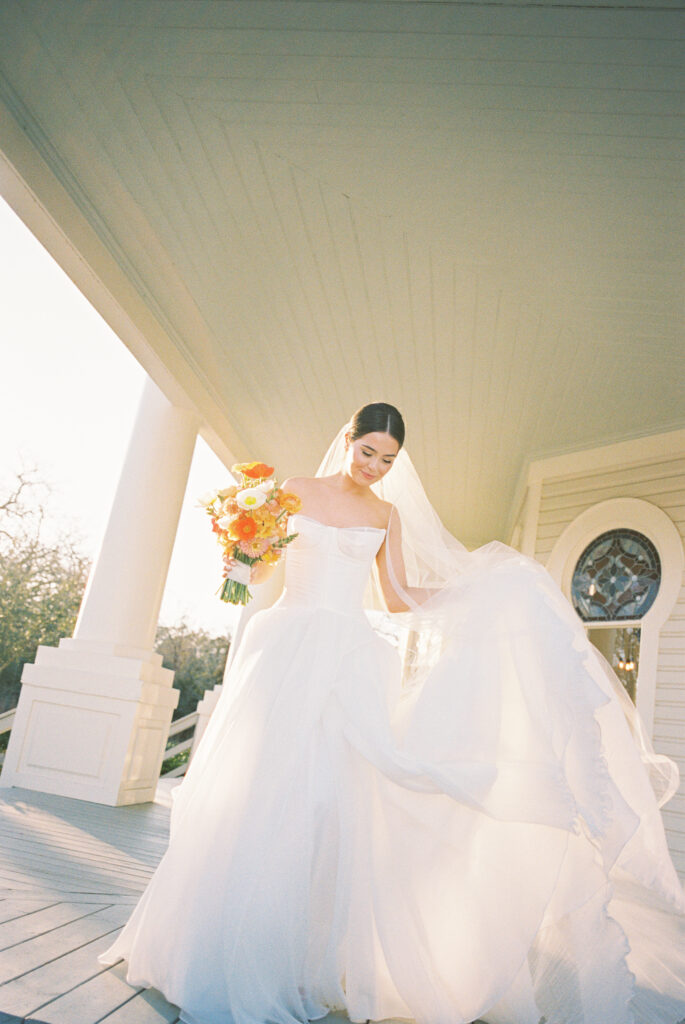 Spring bridal portrait with soft greenery and florals at The Grand Lady Austin