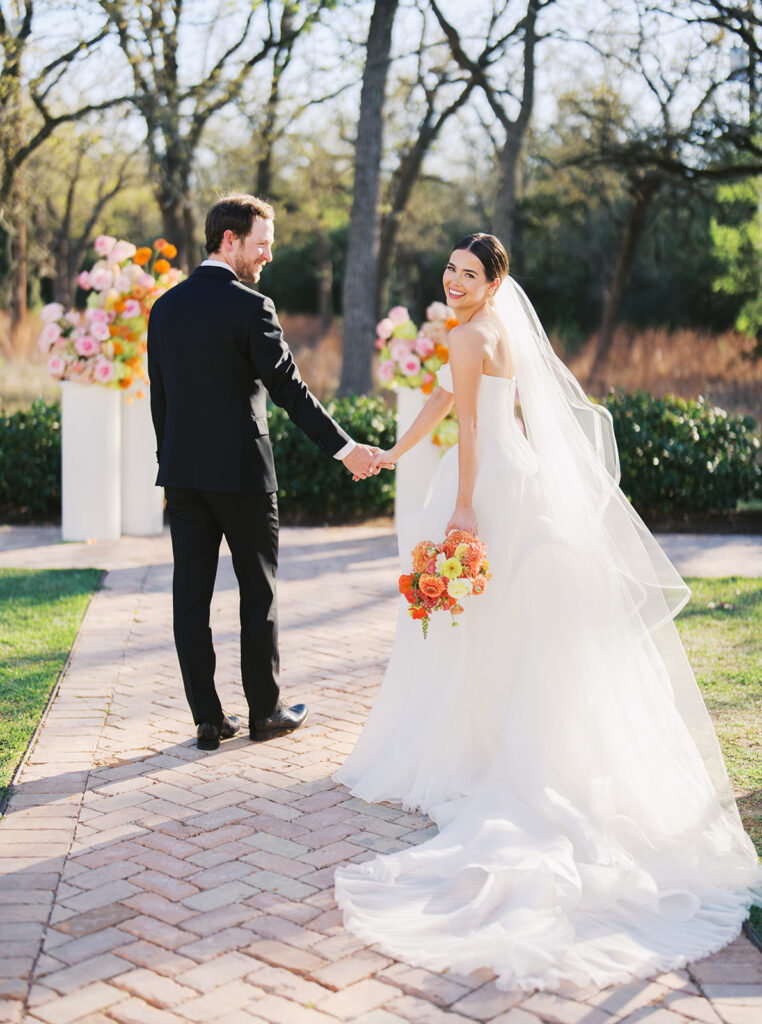 Outdoor wedding ceremony at The Grand Lady wedding venue in Austin TX