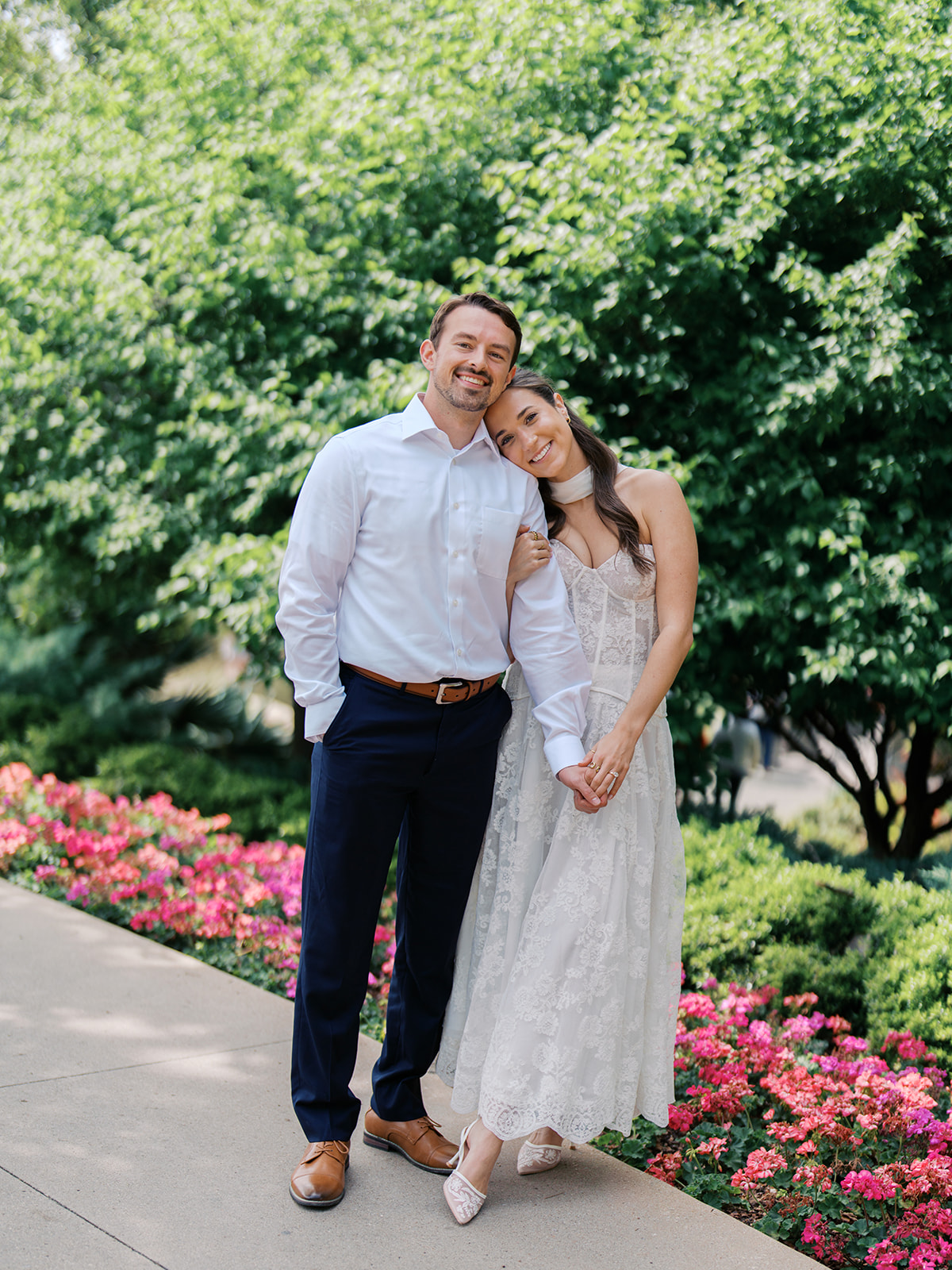 Film engagement portraits at the Dallas Arboretum surrounded by vibrant spring florals