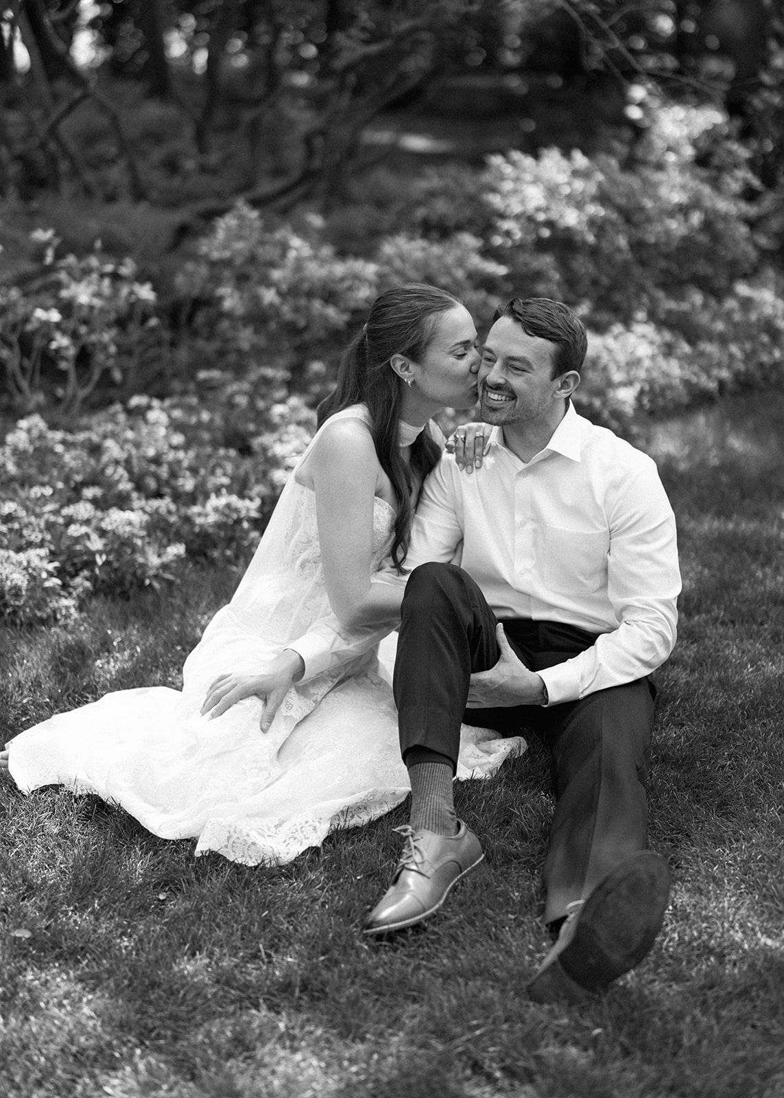 Film engagement portraits at the Dallas Arboretum surrounded by vibrant spring florals