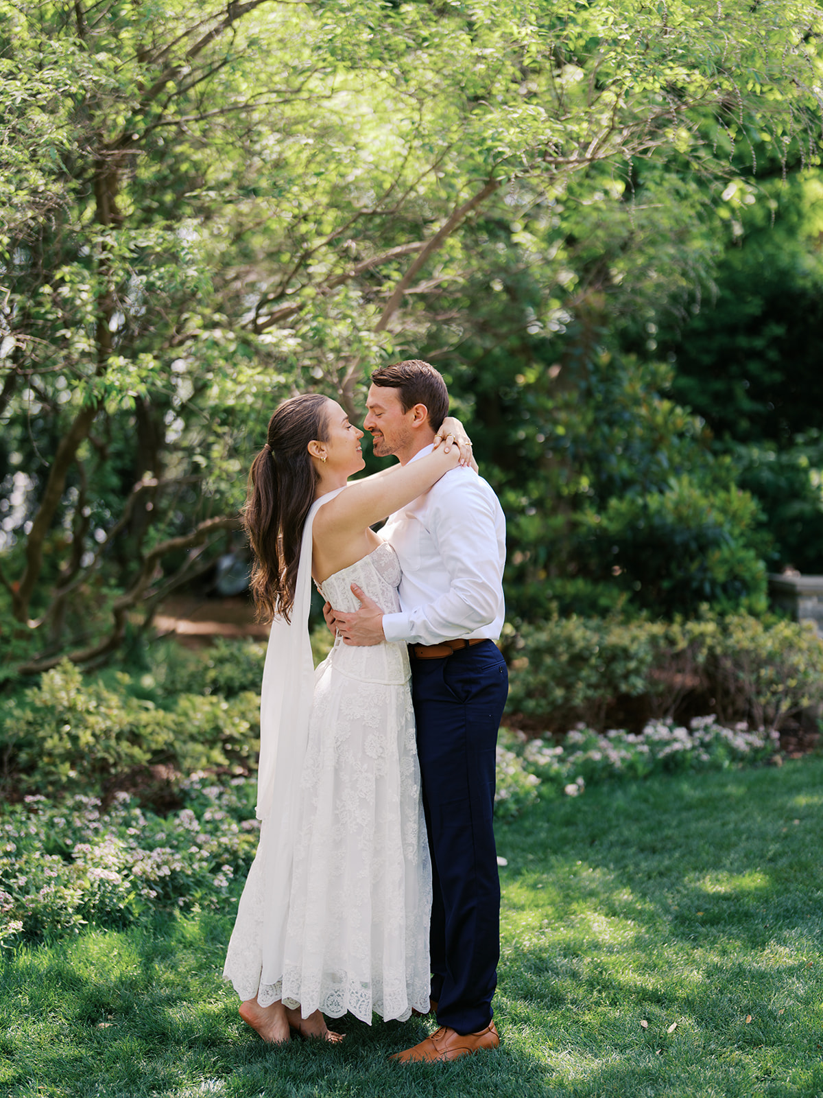 Film engagement portraits at the Dallas Arboretum surrounded by vibrant spring florals