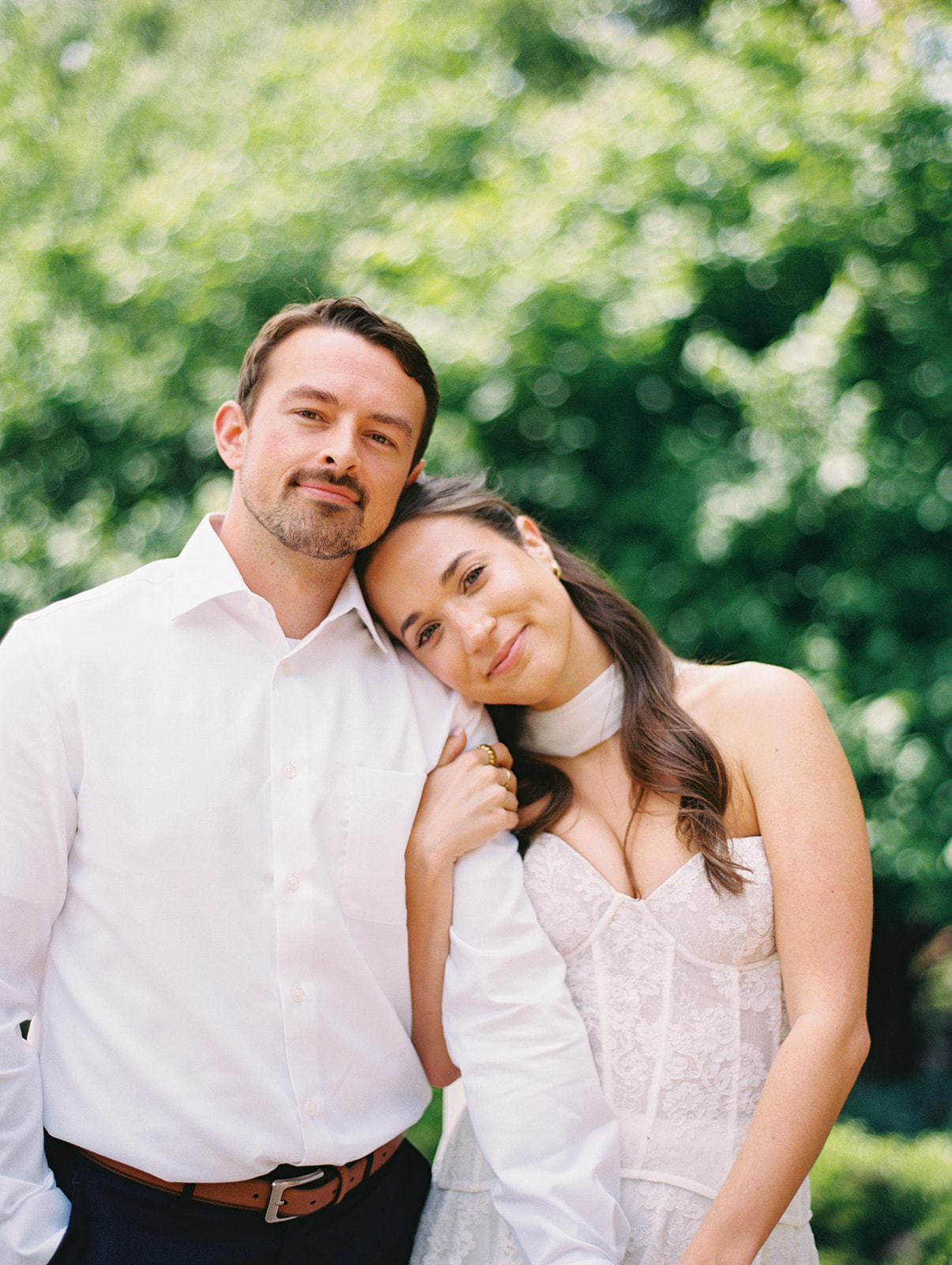 Colorful Dallas Arboretum engagement photos with blooming gardens and sunshine