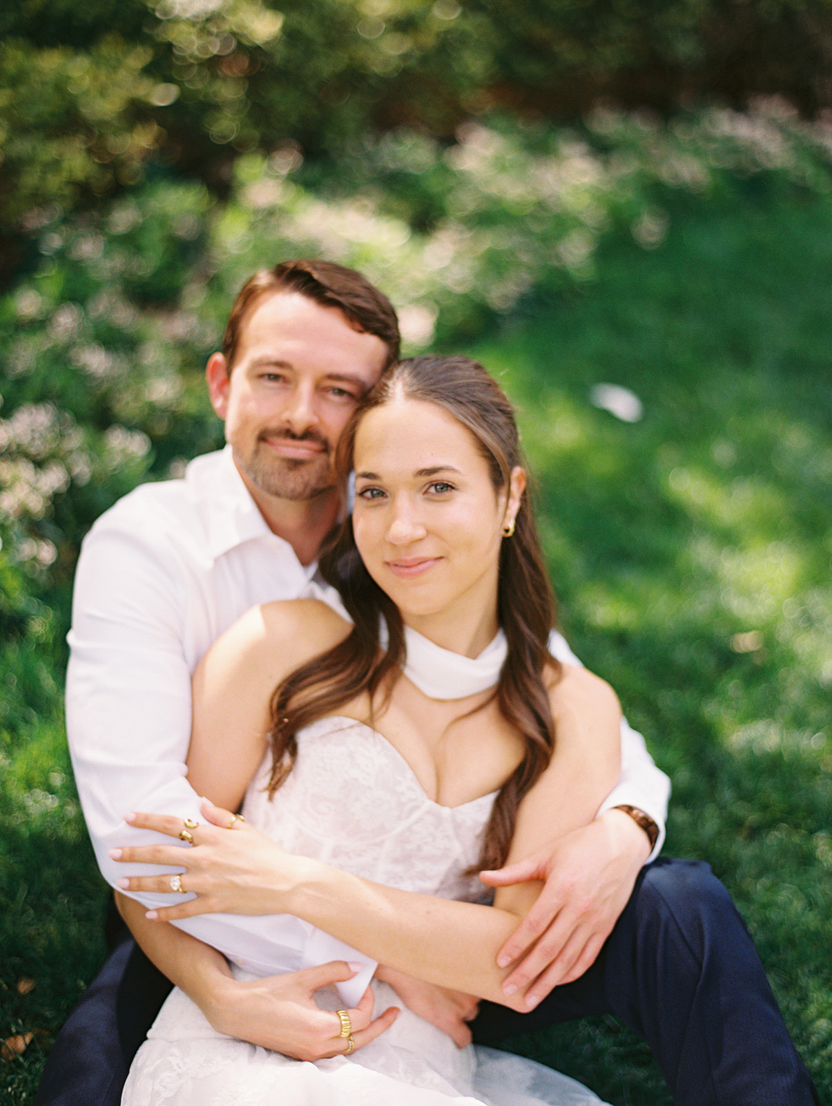 Colorful Dallas Arboretum engagement photos with blooming gardens and sunshine