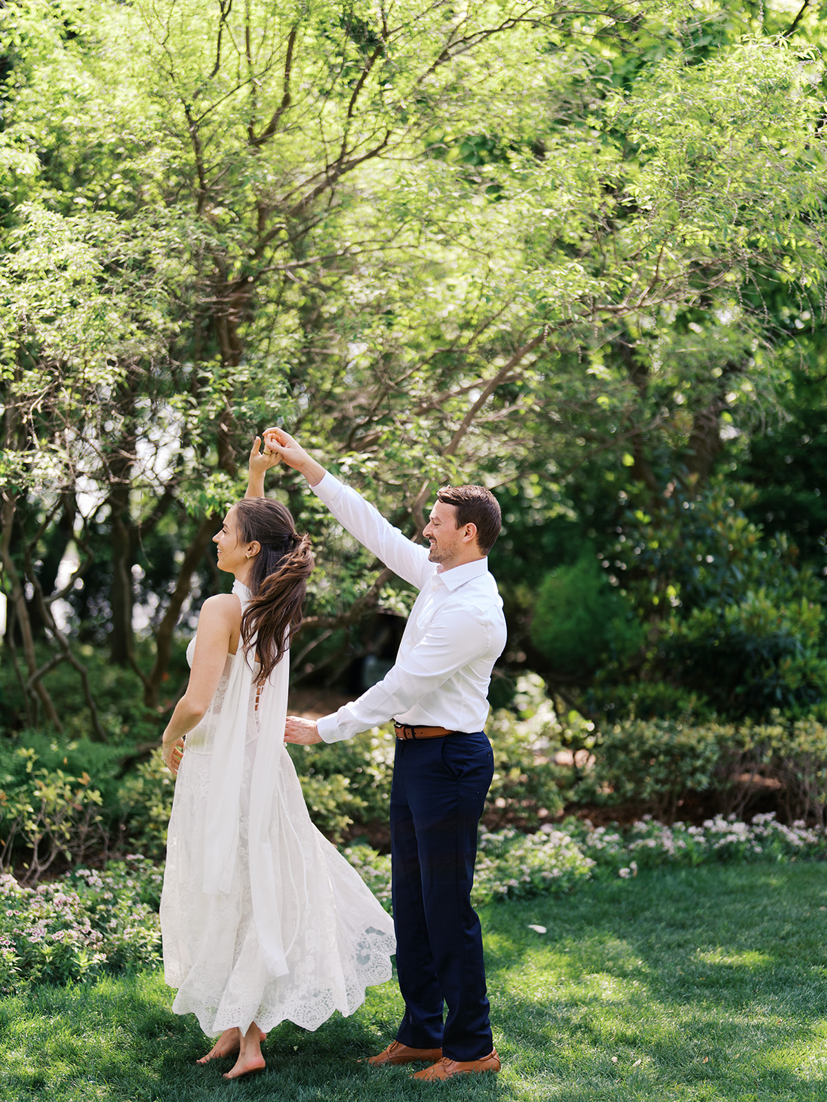 Sunny Dallas Arboretum engagement photos with dreamy film tones and flowers