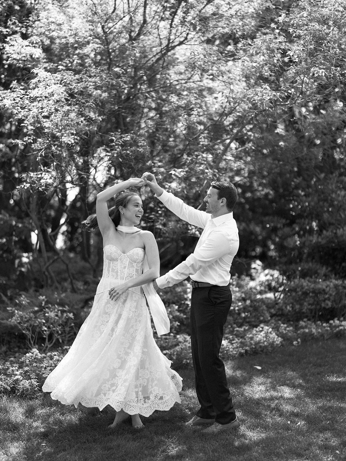 Sunny Dallas Arboretum engagement photos with dreamy film tones and flowers