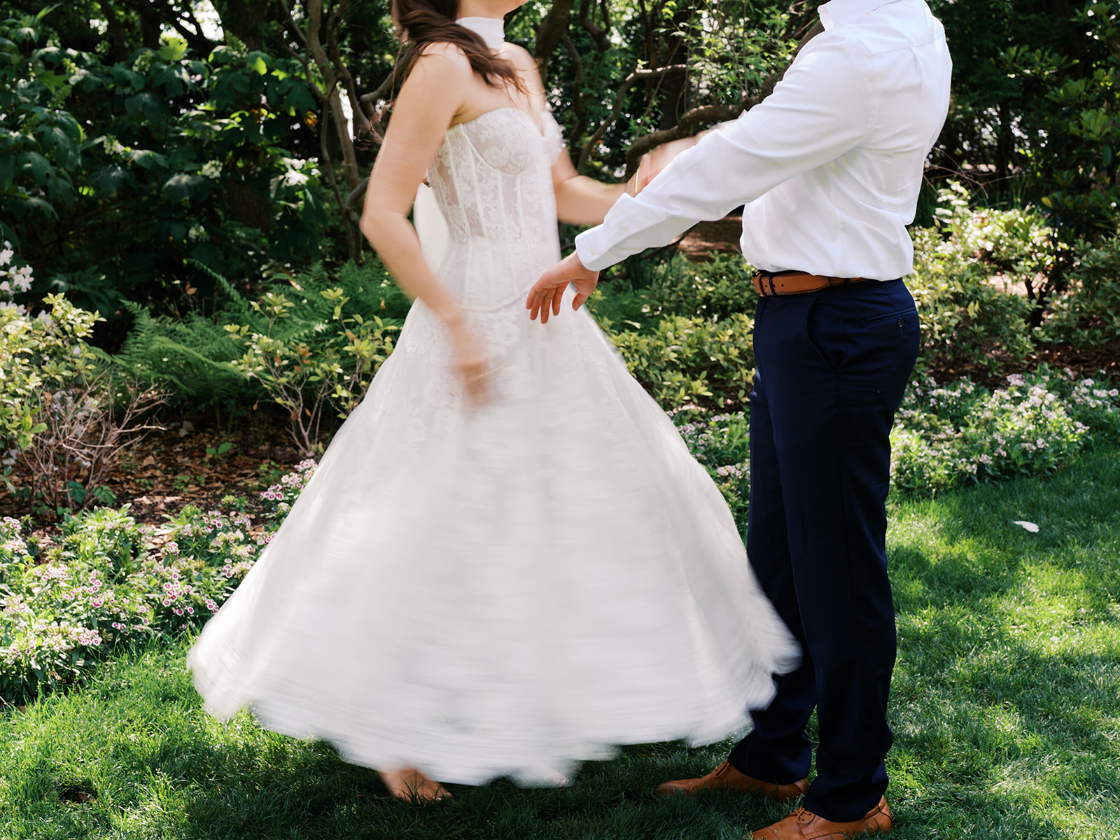 Sunny Dallas Arboretum engagement photos with dreamy film tones and flowers