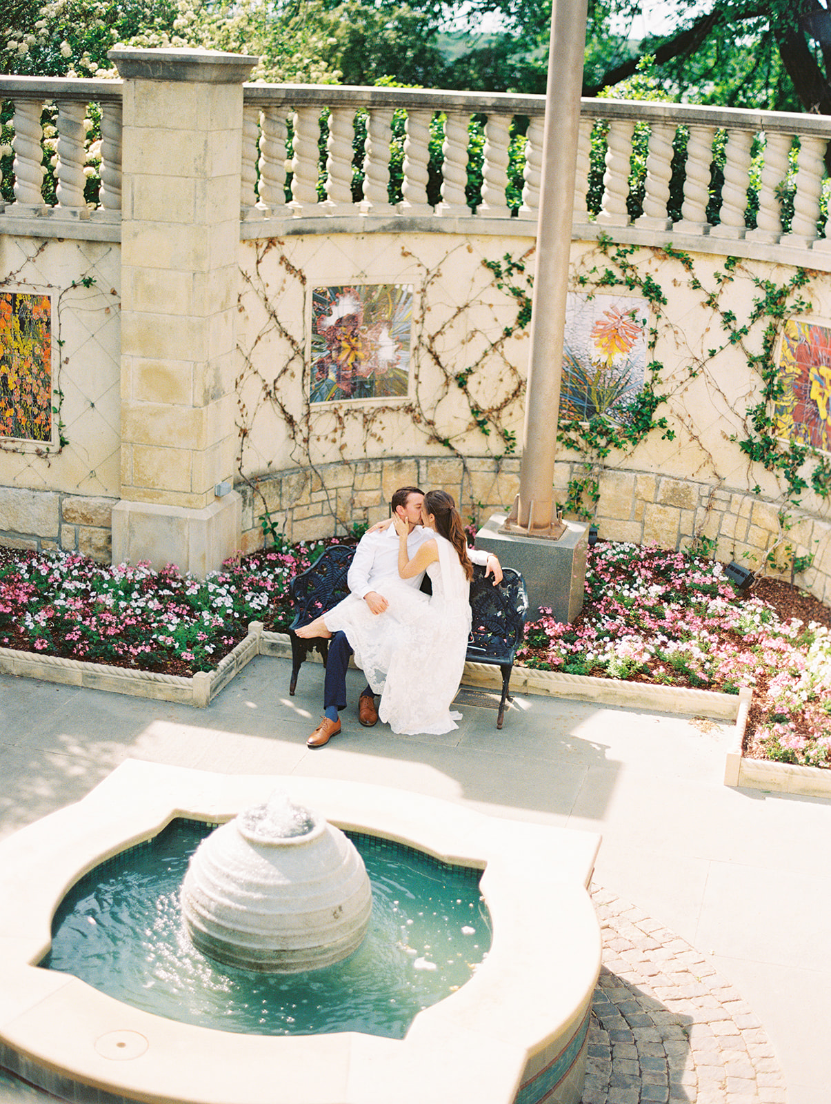 Colorful Dallas Arboretum engagement photos with blooming gardens and sunshine