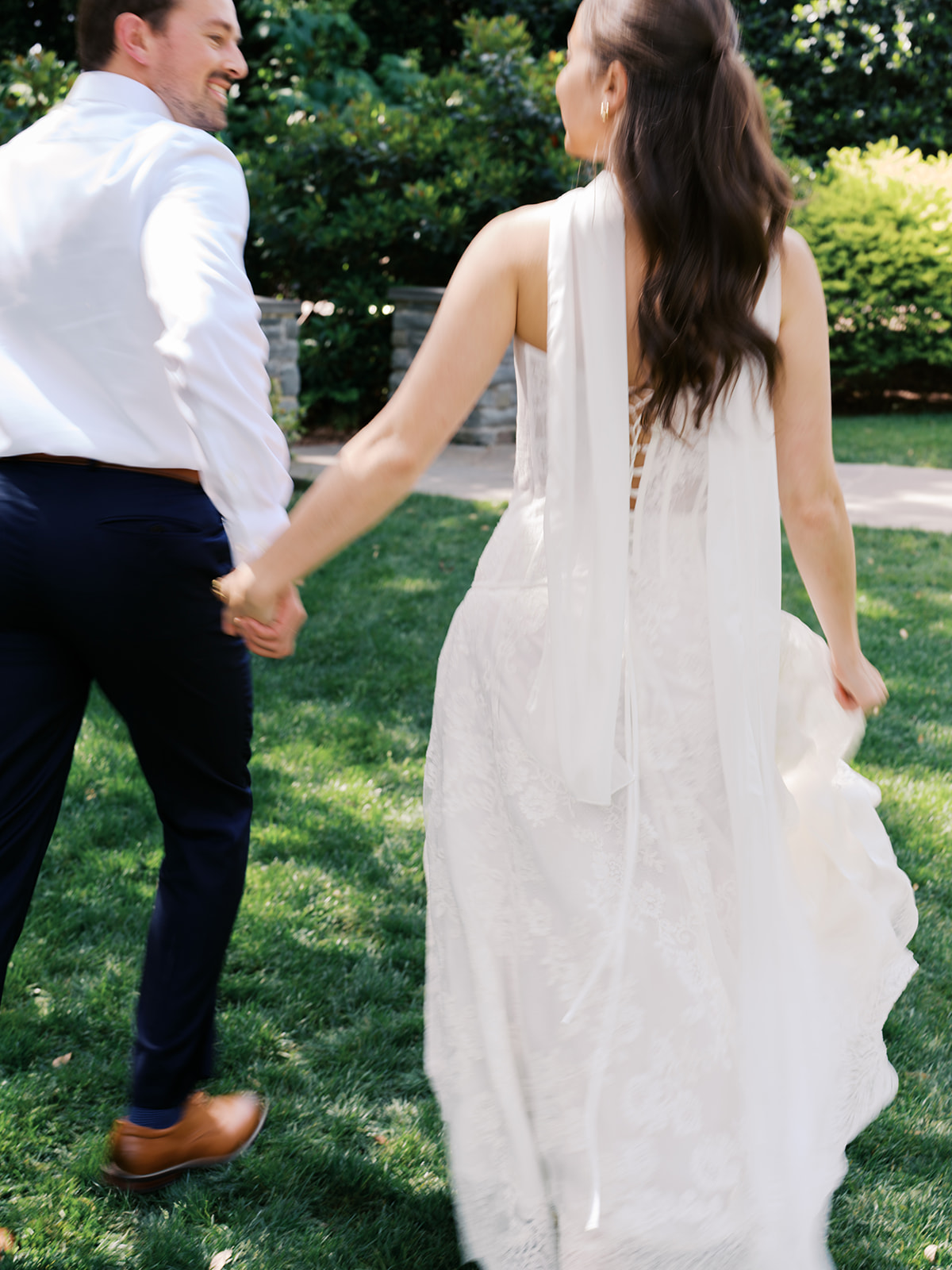 Sunny Dallas Arboretum engagement photos with dreamy film tones and flowers