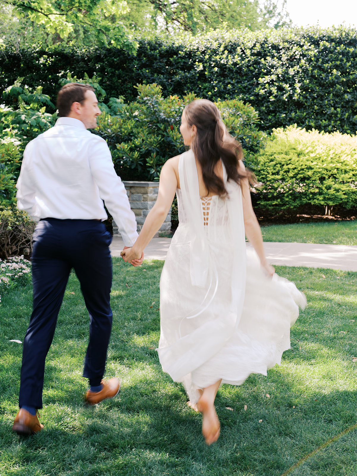 Sunny Dallas Arboretum engagement photos with dreamy film tones and flowers