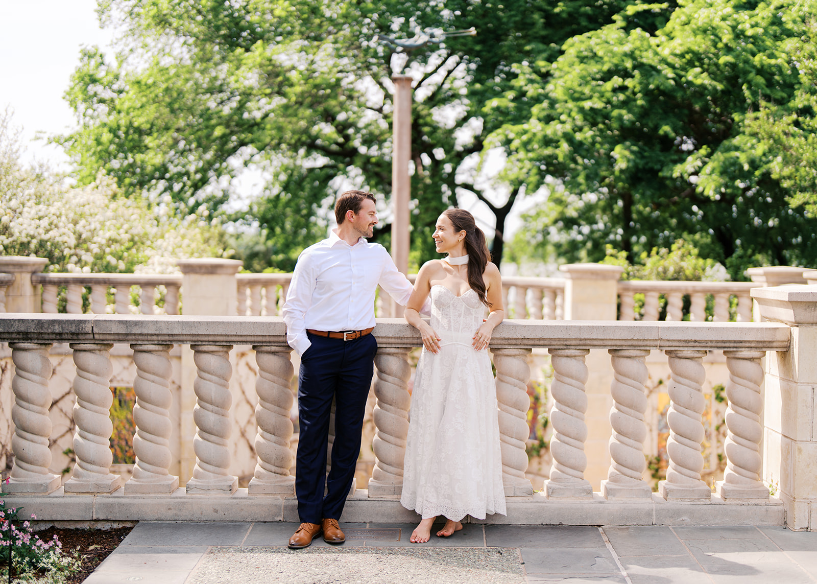Sunny Dallas Arboretum engagement photos with dreamy film tones and flowers