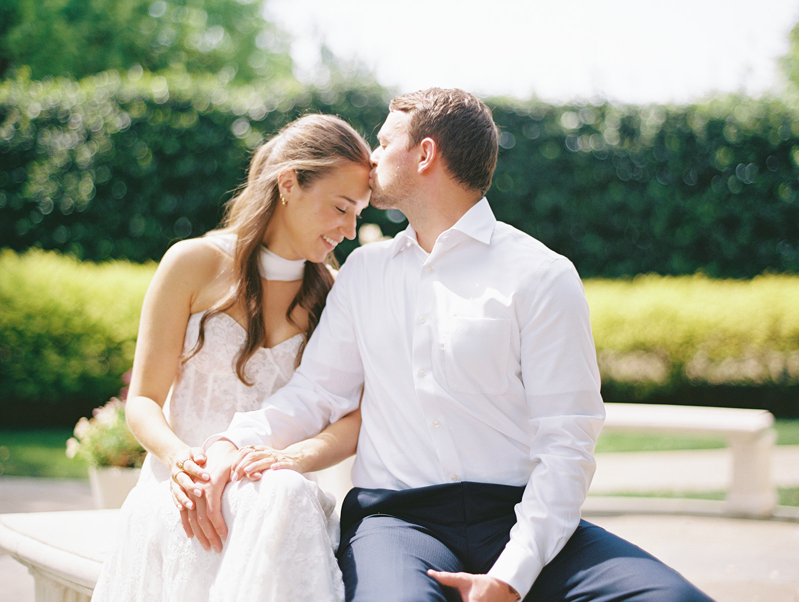 Colorful Dallas Arboretum engagement photos with blooming gardens and sunshine