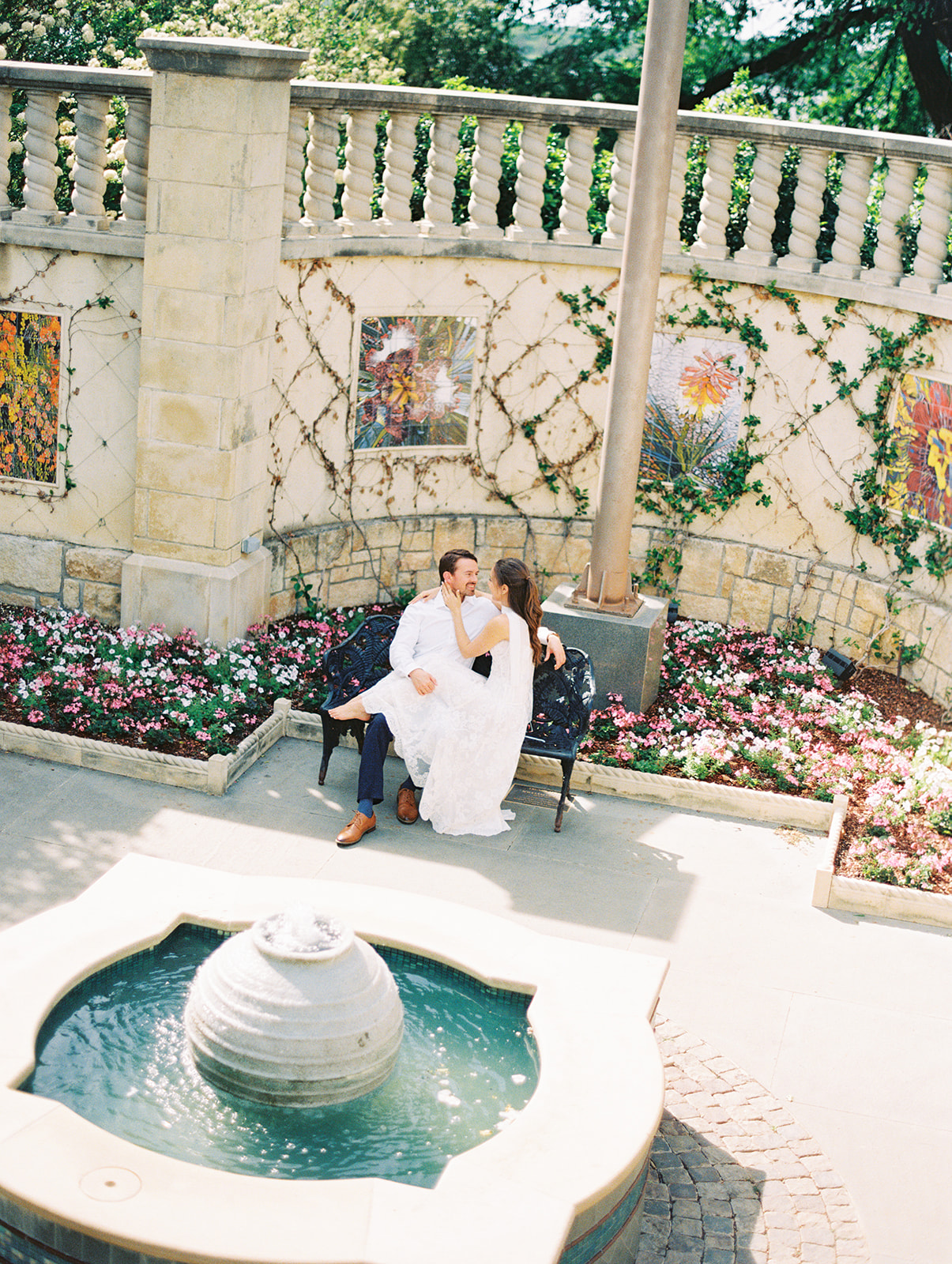 Film engagement portraits at the Dallas Arboretum surrounded by vibrant spring florals