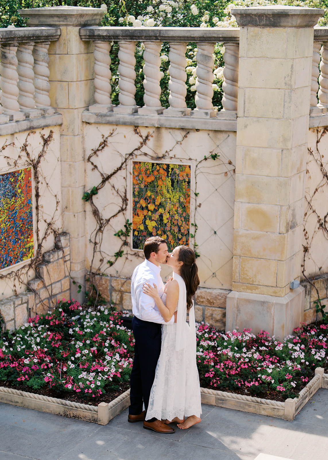 Sunny Dallas Arboretum engagement photos with dreamy film tones and flowers