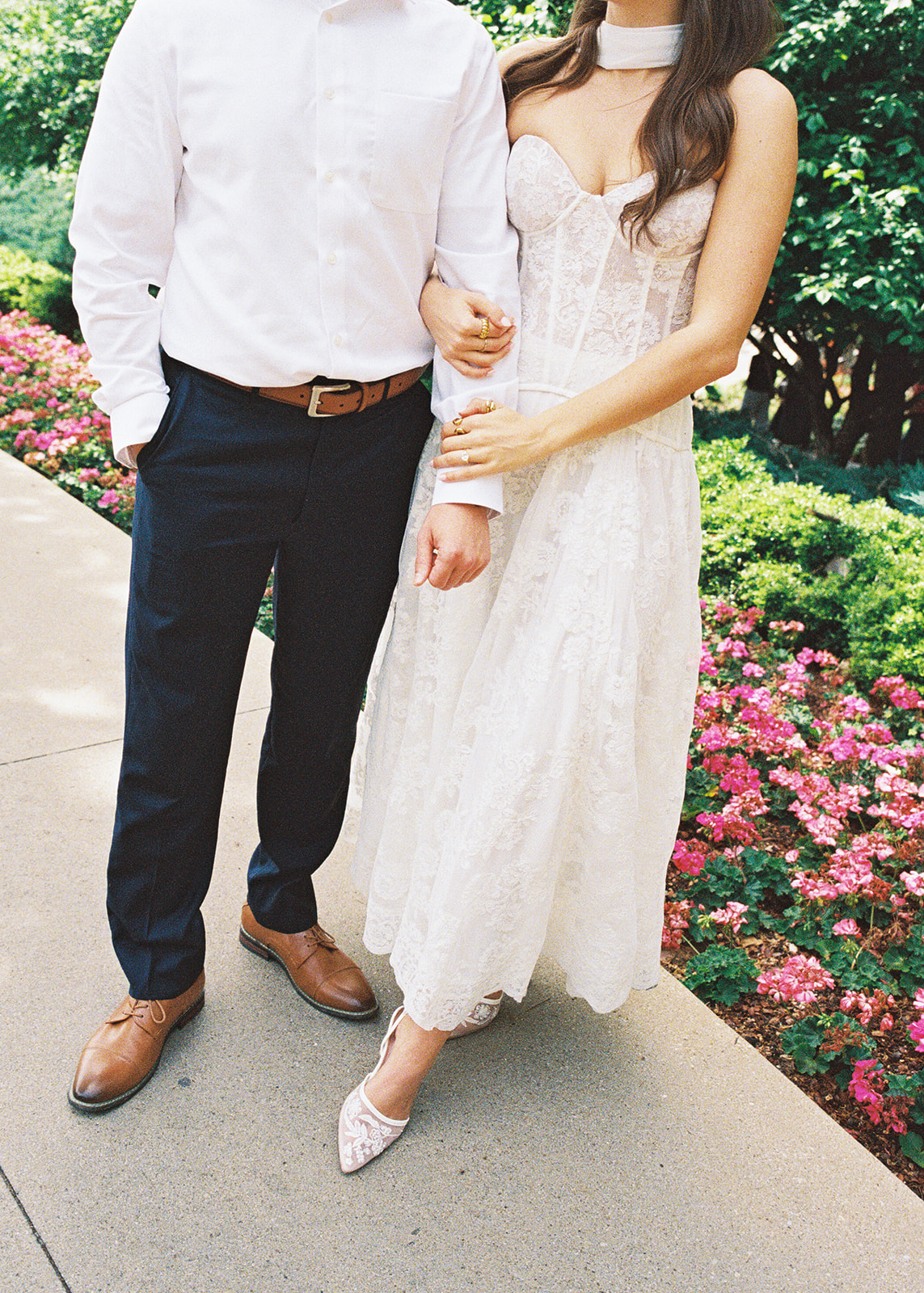 Film engagement portraits at the Dallas Arboretum surrounded by vibrant spring florals