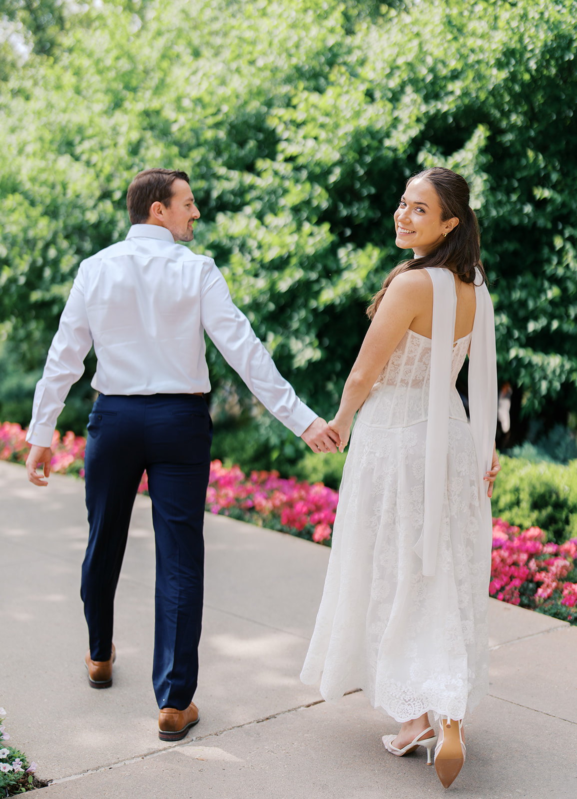 Film engagement portraits at the Dallas Arboretum surrounded by vibrant spring florals
