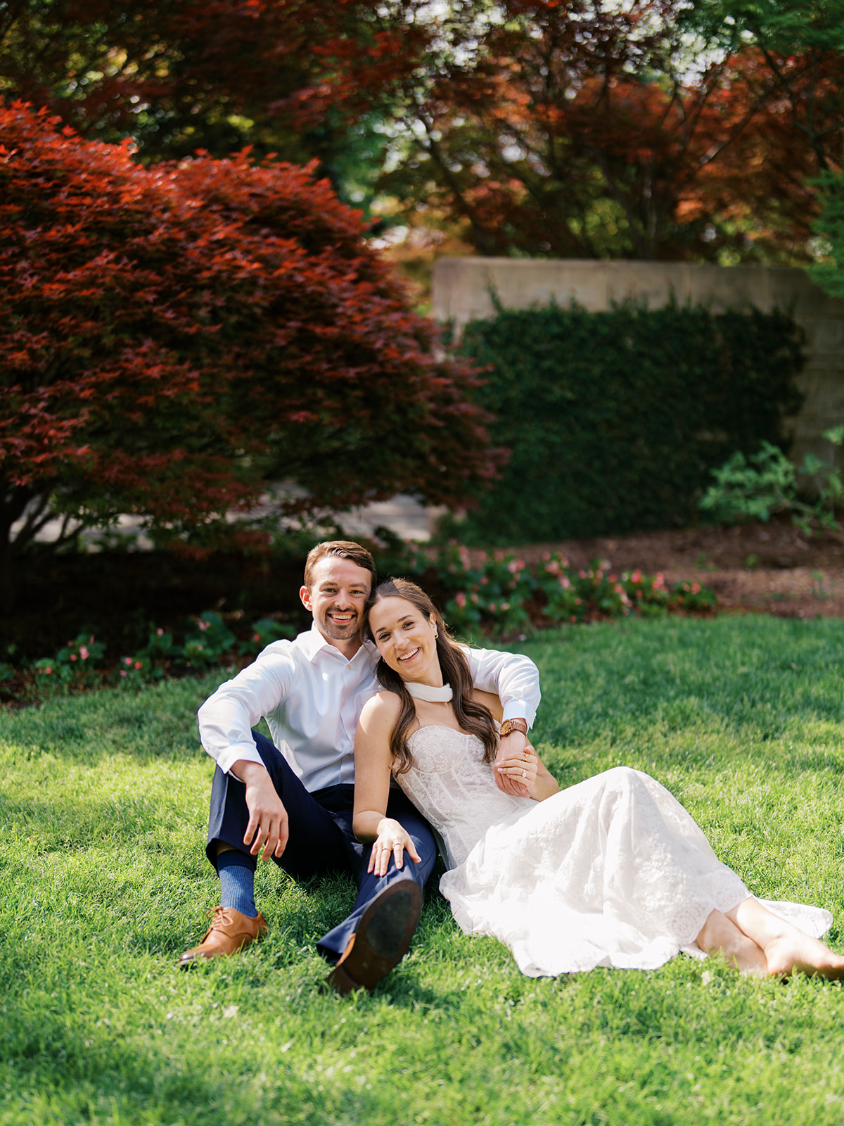 Sunny Dallas Arboretum engagement photos with dreamy film tones and flowers