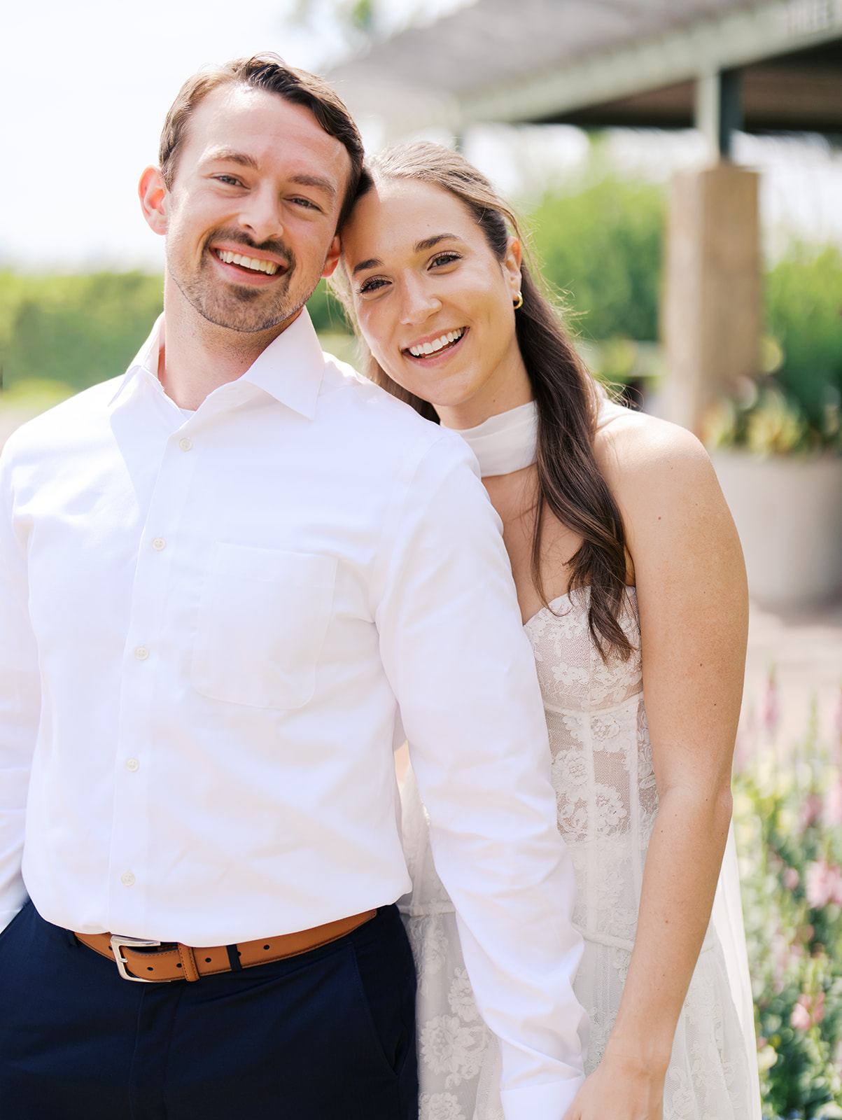 Film engagement portraits at the Dallas Arboretum surrounded by vibrant spring florals