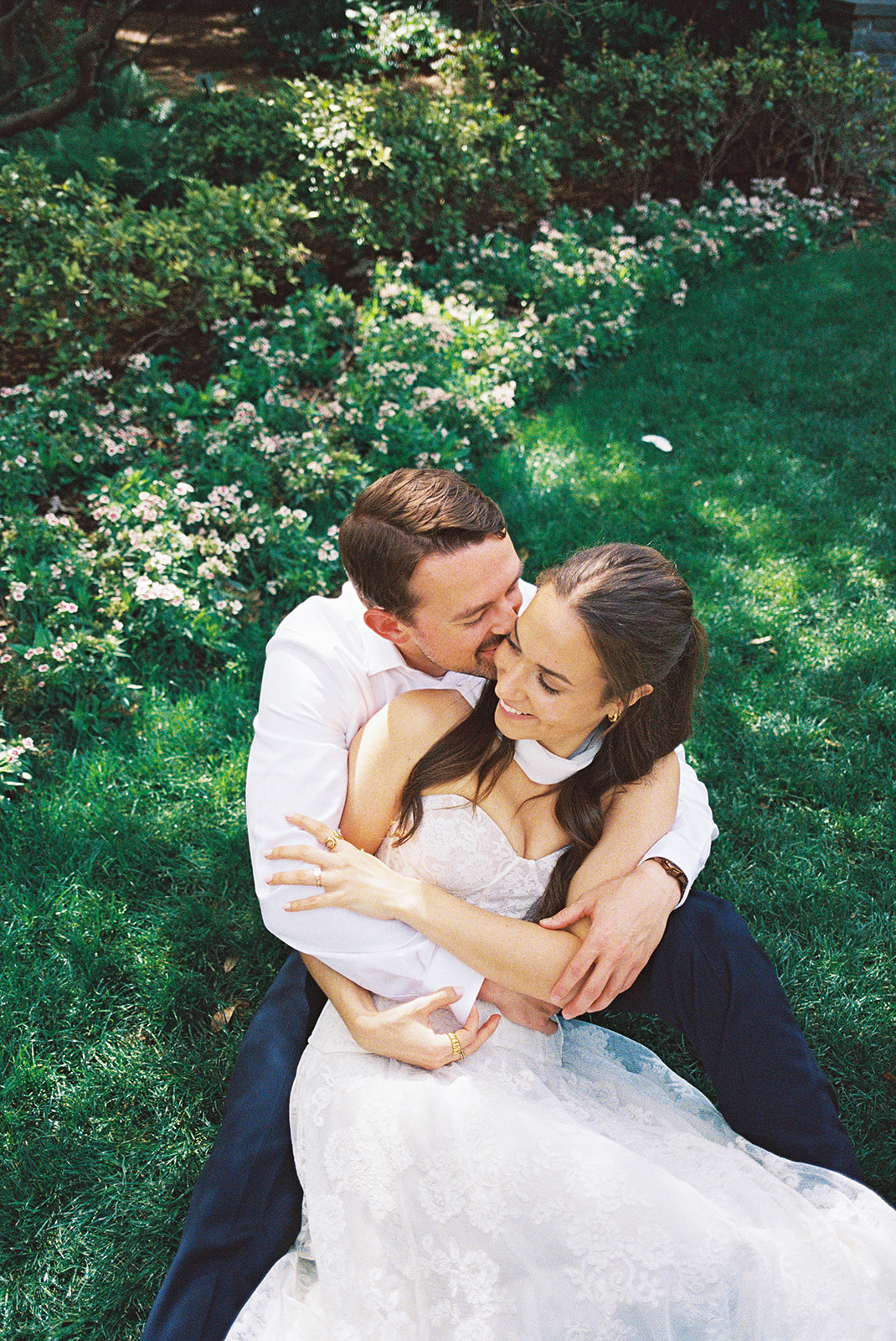 Dallas Arboretum film engagement photos with spring flowers and golden sunshine
