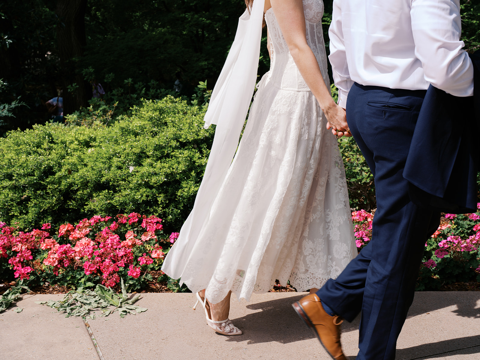 Film engagement portraits at the Dallas Arboretum surrounded by vibrant spring florals