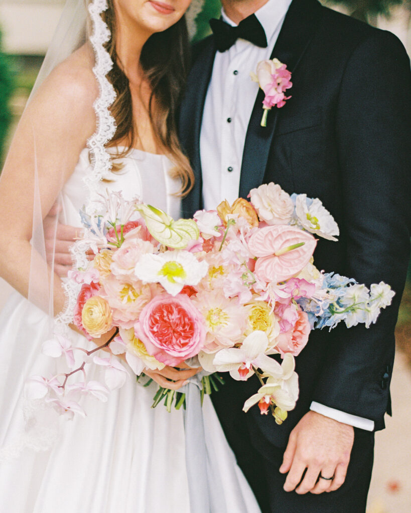 Colorful wedding at the Fort Worth Zoo with elegant floral design