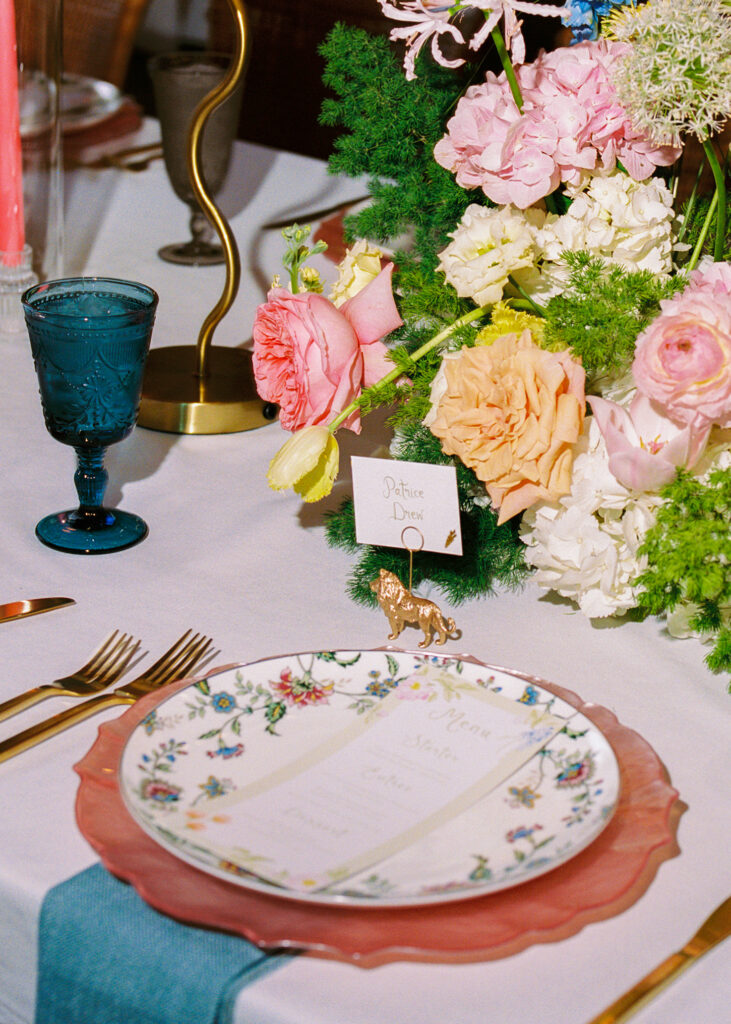 Colorful wedding at the Fort Worth Zoo with elegant floral design