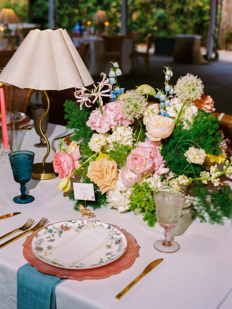 Colorful wedding at the Fort Worth Zoo with elegant floral design
