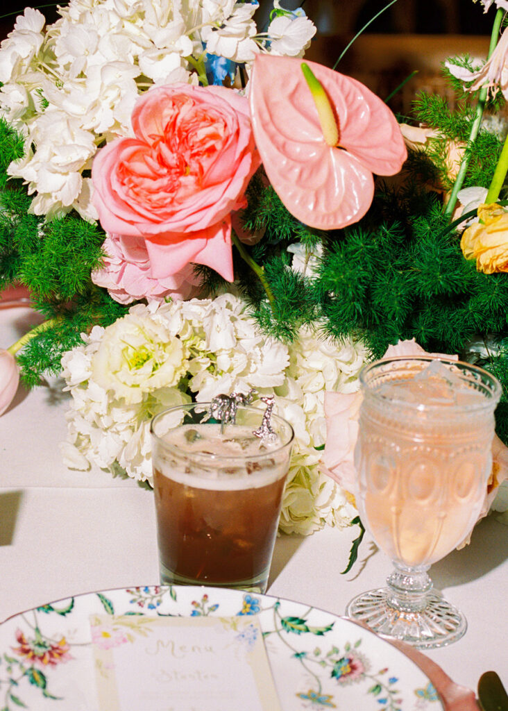 Colorful wedding at the Fort Worth Zoo with elegant floral design