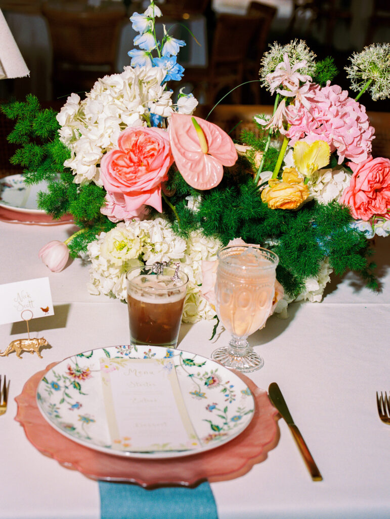 Colorful wedding at the Fort Worth Zoo with elegant floral design