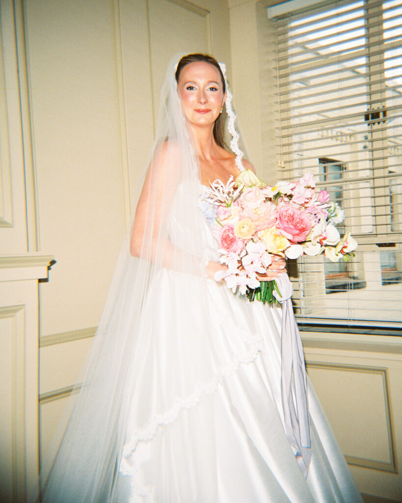 Colorful wedding at the Fort Worth Zoo with elegant floral design