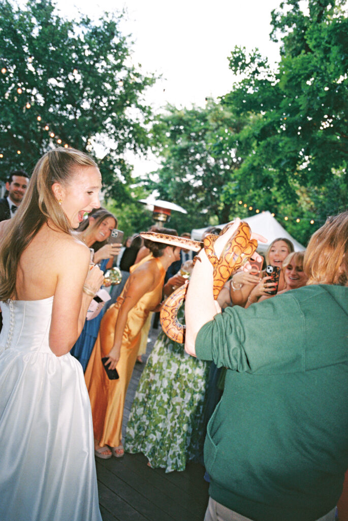 Joyful Fort Worth Zoo wedding with colorful flowers and glowing light
