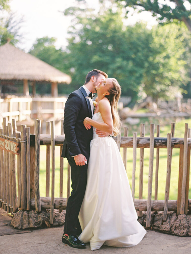 Joyful Fort Worth Zoo wedding with colorful flowers and glowing light
