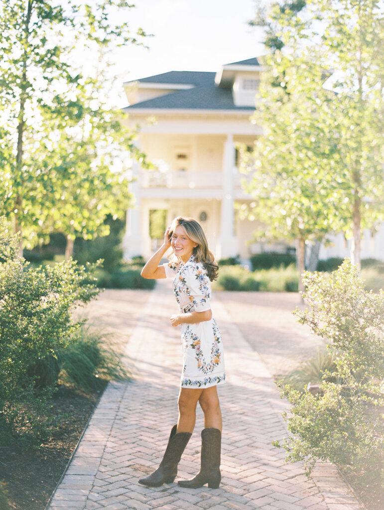 Grand Lady senior photos captured on film with glowing golden hour light