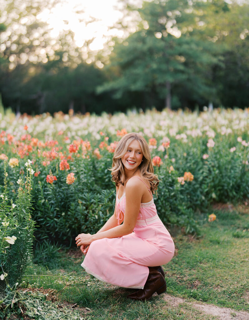 Film senior session with soft sunshine and white architecture at The Grand Lady