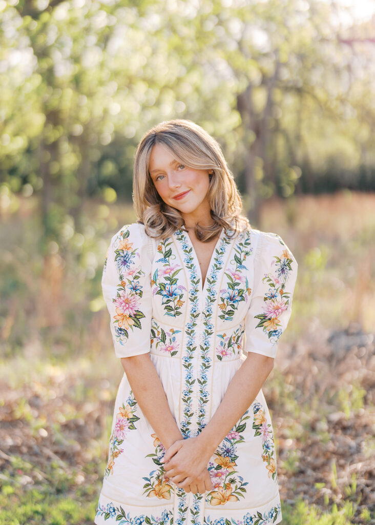 Grand Lady senior photos captured on film with glowing golden hour light
