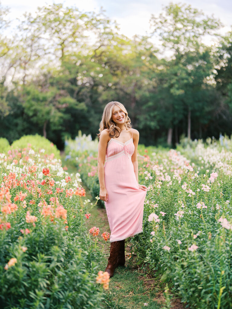 Film senior session with soft sunshine and white architecture at The Grand Lady