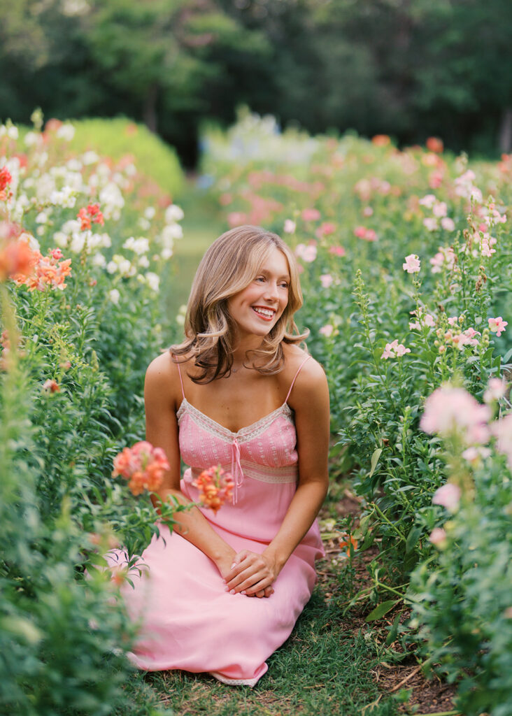 Film senior session with soft sunshine and white architecture at The Grand Lady