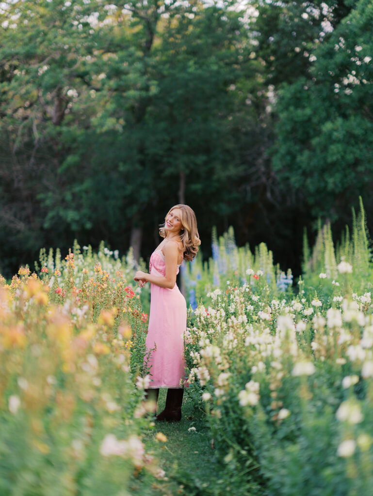 Austin senior photographer capturing timeless film senior portraits at The Grand Lady