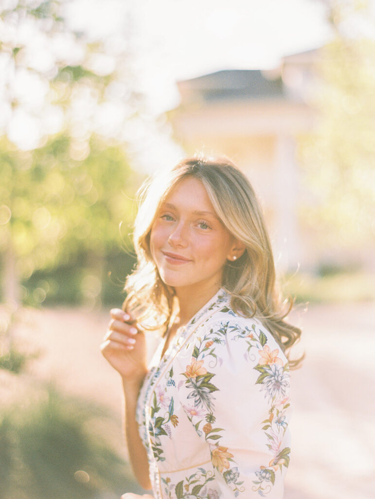 Grand Lady senior photos captured on film with glowing golden hour light