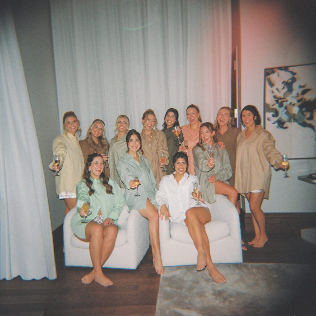 Bride getting ready with her bridesmaids before her Horseshoe Bay Resort wedding overlooking Lake LBJ in Texas.