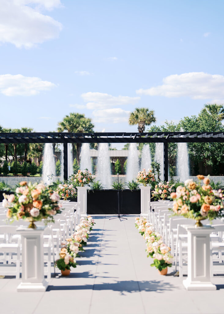 Bride and groom exchanging vows during an outdoor Horseshoe Bay Resort wedding ceremony with beautiful Texas waterfront views