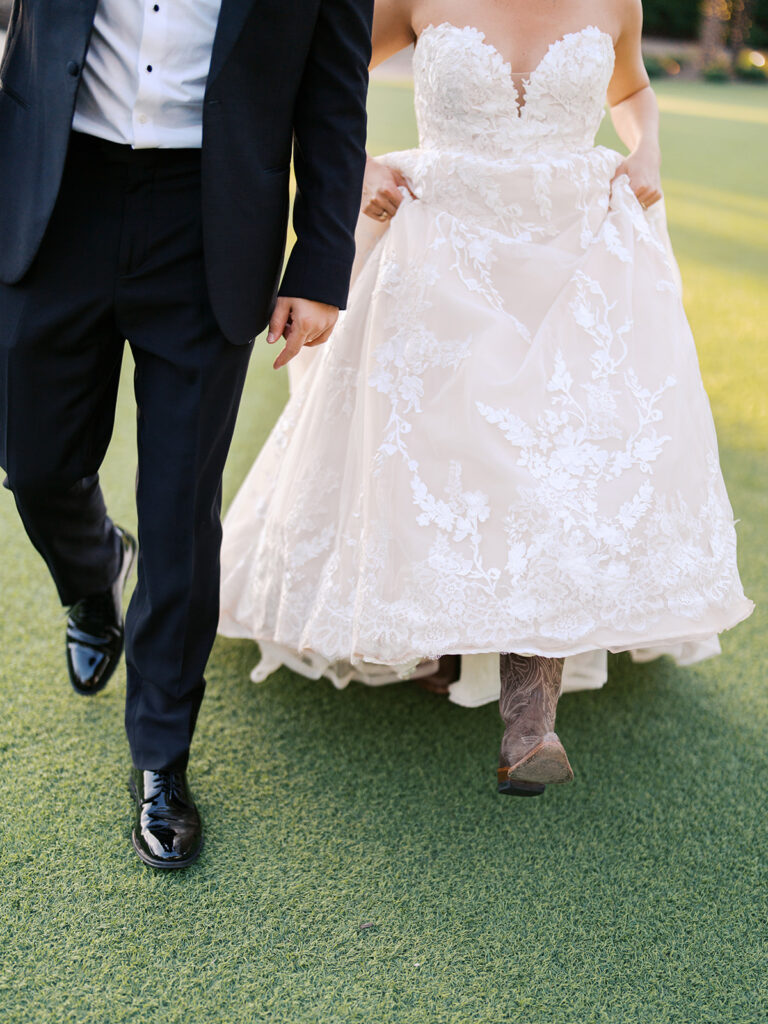 Bride and groom sharing romantic wedding portraits at Horseshoe Bay Resort surrounded by sunshine and stunning Lake LBJ scenery.