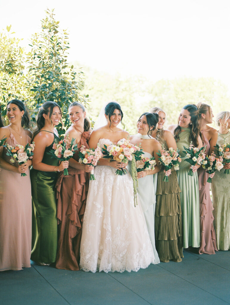 Bride and groom sharing romantic wedding portraits at Horseshoe Bay Resort surrounded by sunshine and stunning Lake LBJ scenery.