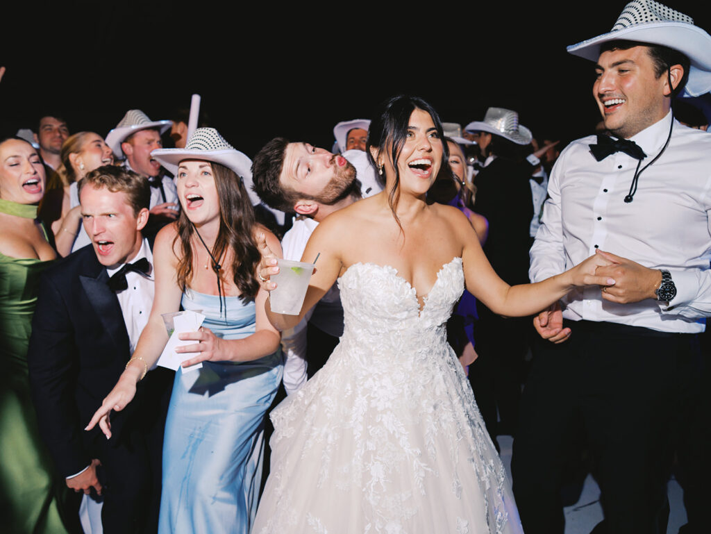Guests celebrating during an elegant Horseshoe Bay Resort wedding reception filled with joyful dancing, heartfelt moments, and warm Texas hospitality