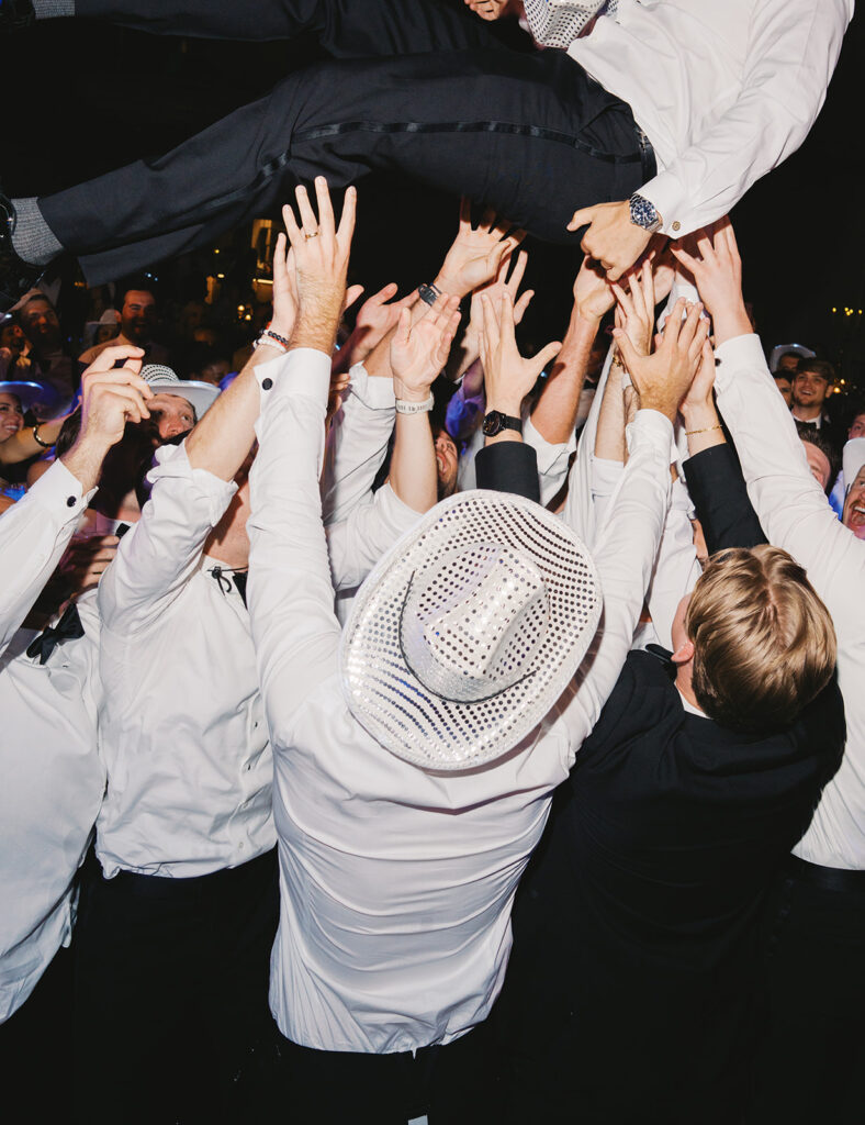 Guests celebrating during an elegant Horseshoe Bay Resort wedding reception filled with joyful dancing, heartfelt moments, and warm Texas hospitality