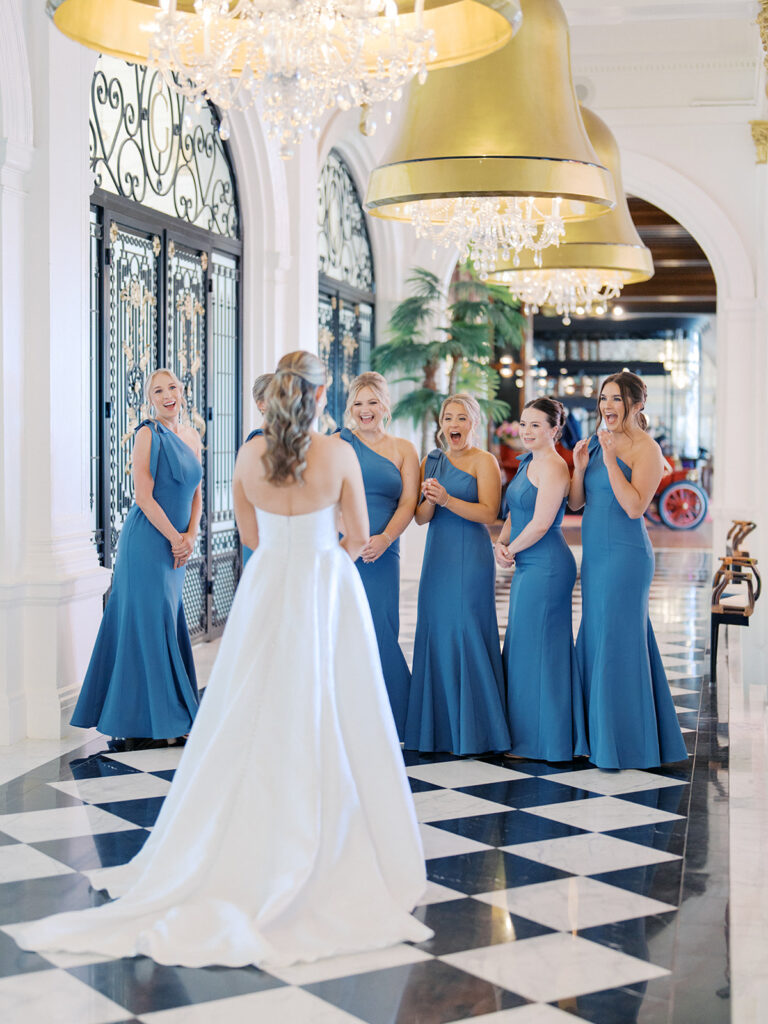 Bride and groom sharing romantic wedding portraits at the Grand Galvez in Galveston, Texas with historic architecture and coastal views.