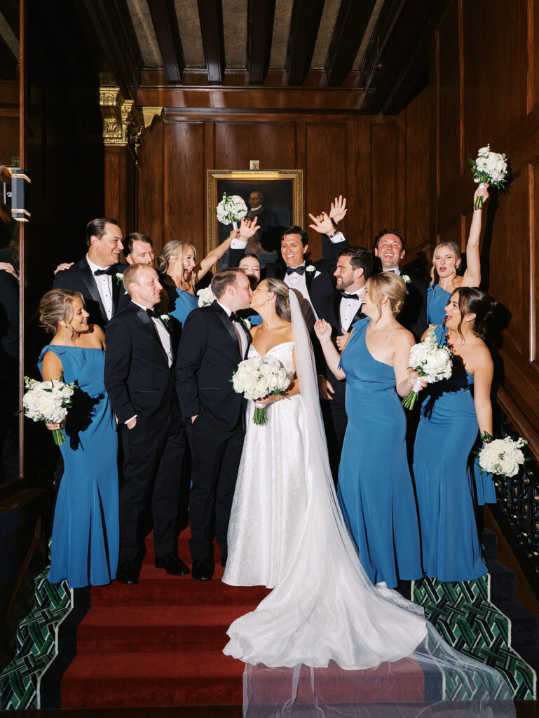 Bride and groom sharing romantic wedding portraits at the Grand Galvez in Galveston, Texas with historic architecture and coastal views.