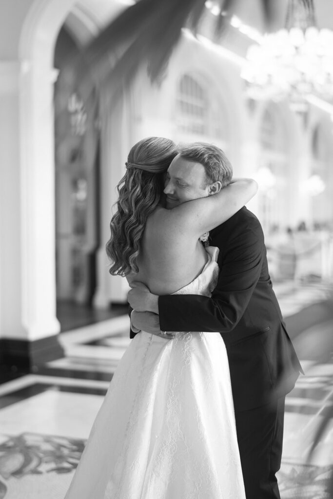 Bride getting ready with her bridesmaids before her elegant wedding at the Grand Galvez in Galveston, Texas.